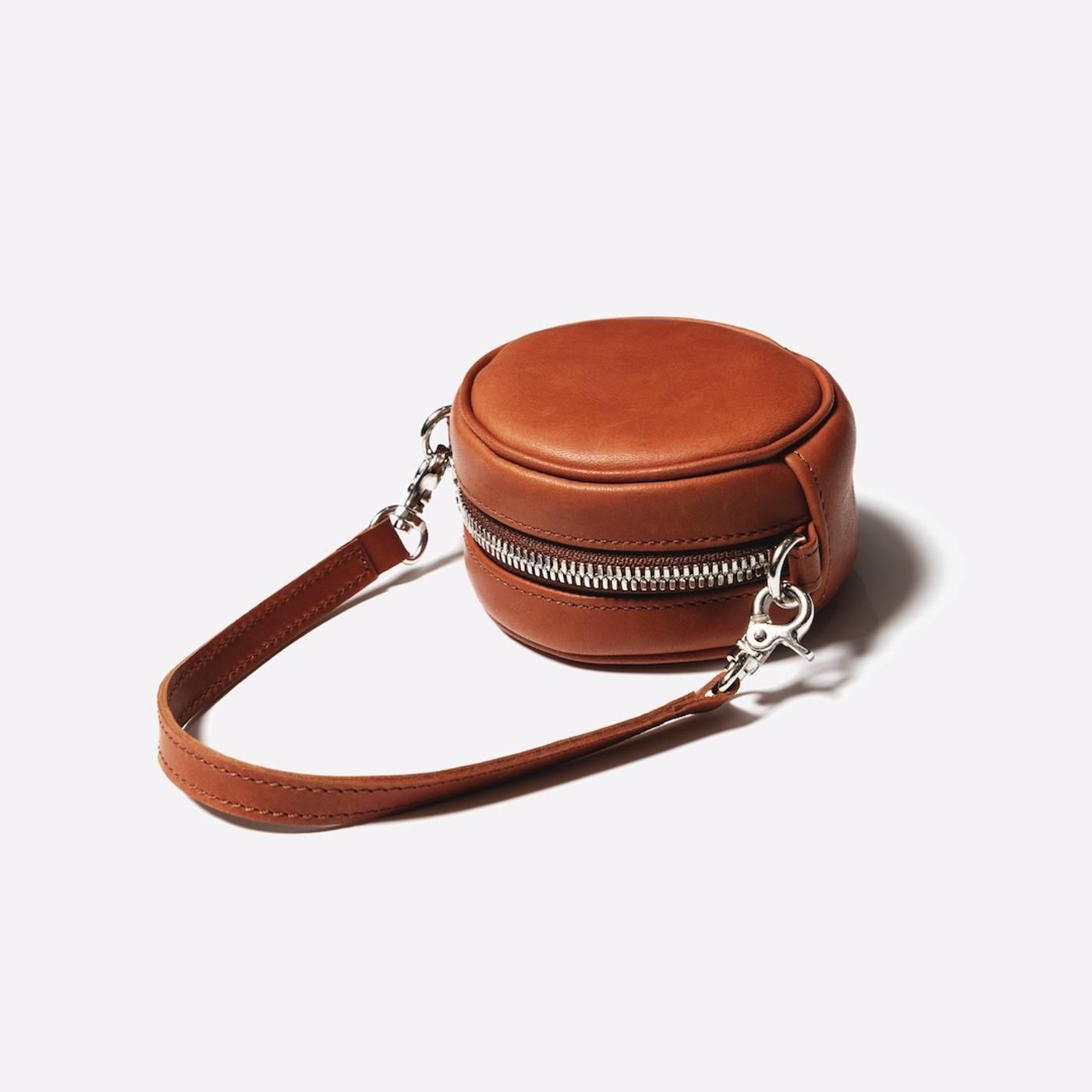 Unlikely * U25F-61-0009 Unlikely ”Leather” Reel Case(2色展開)