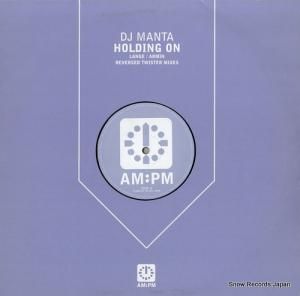 DJ MANTA holding on 12AMPM125/562384-1