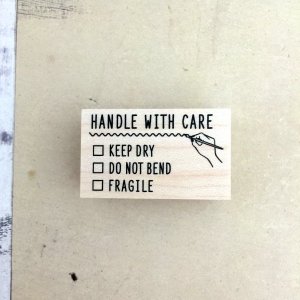 E-1264 handle with care
