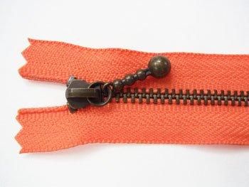 YKK 3GKB 玉付きファスナー 16cm アンティークゴールド col.523 オレンジ