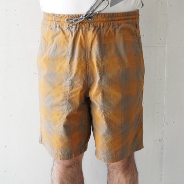and wander(アンドワンダー) dry check shorts (M)