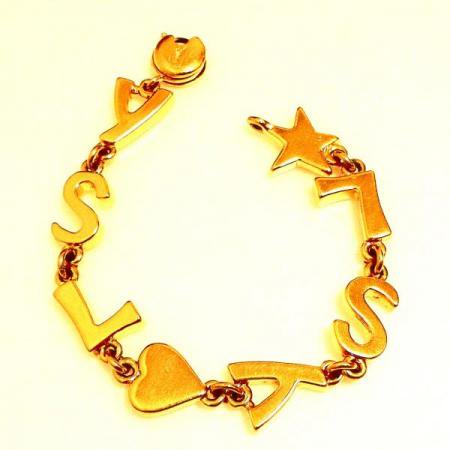 Yves Saint Laurent Vintage Bracelet YSL Logo with Heart Star