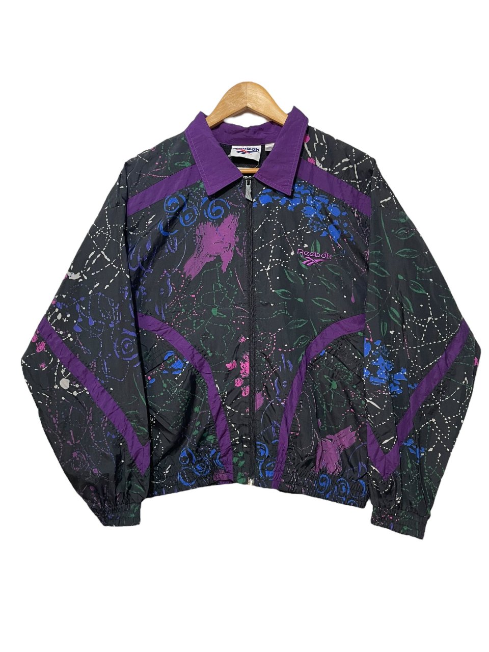 90s Reebok Logo Nylon Jacket 黒紫 M リーボック ナイロンジャケット 総柄 ブラック パープル 古着 - NEWJOKE  ONLINE STORE