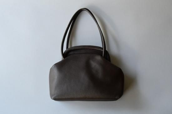 kumono がま口のハンドバッグ