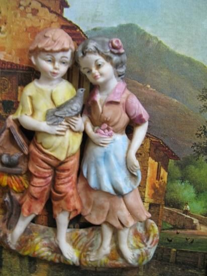 アンティークインドの少年陶器製ウォールデコレーション