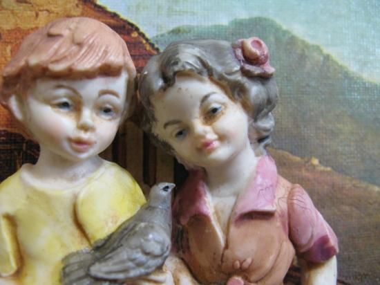 アンティークインドの少年陶器製ウォールデコレーション