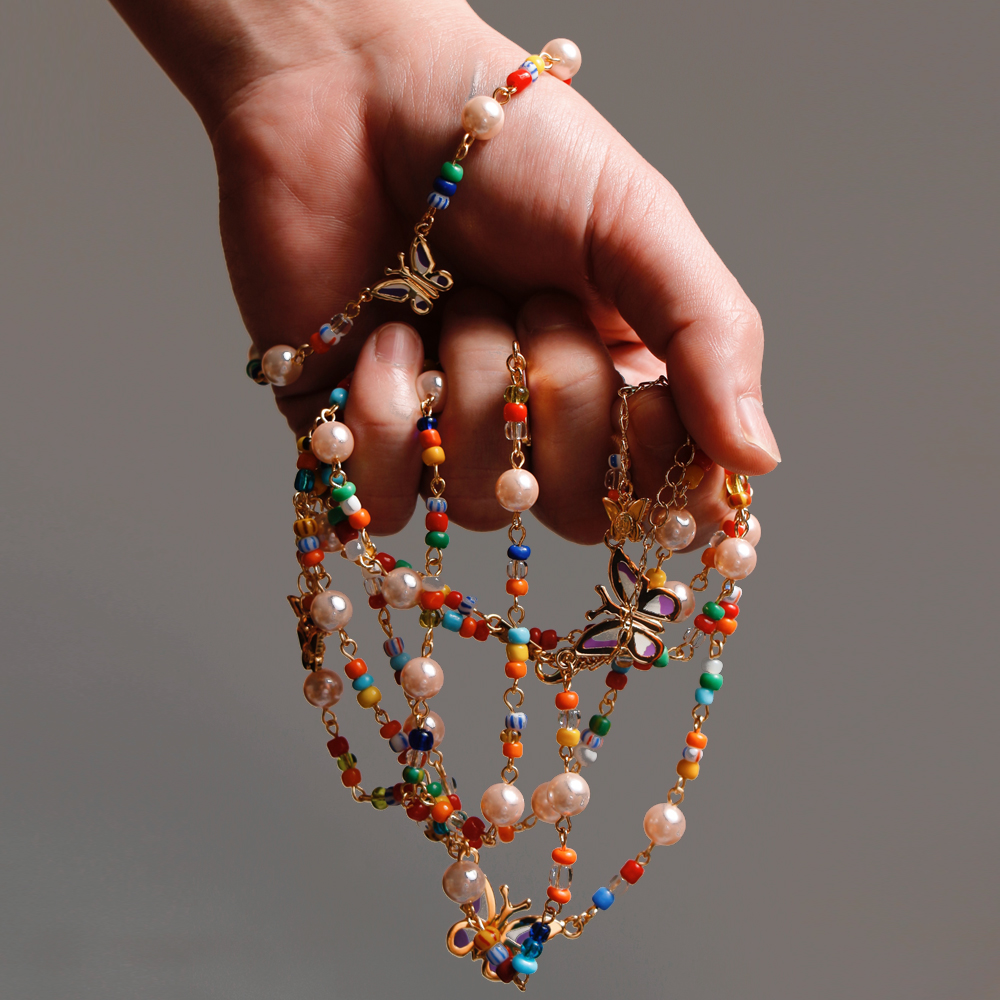 スペインSfera★注目ピンク映え フリンジ揺れるビーズショルダー STUGAZI(スガジ)商品ページ - Exclusive Rainbow Beads Angel