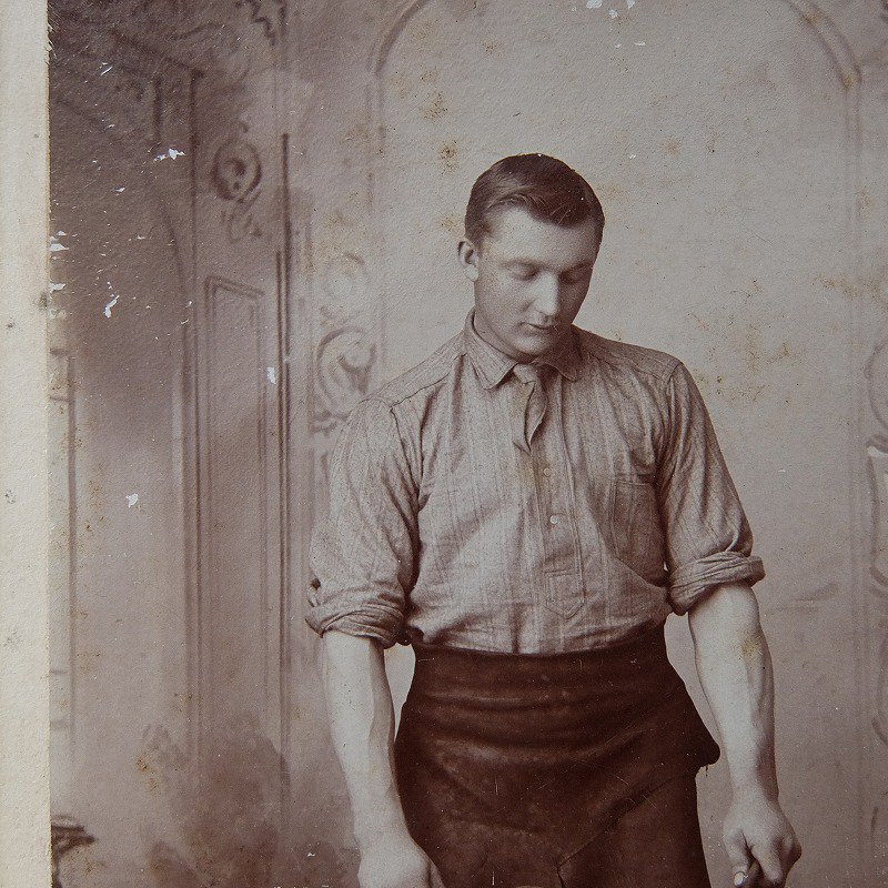 1900's Iron Hammering Worker Photo