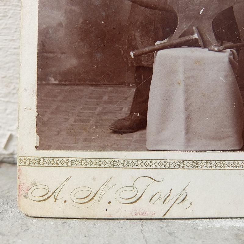 1900's Iron Hammering Worker Photo