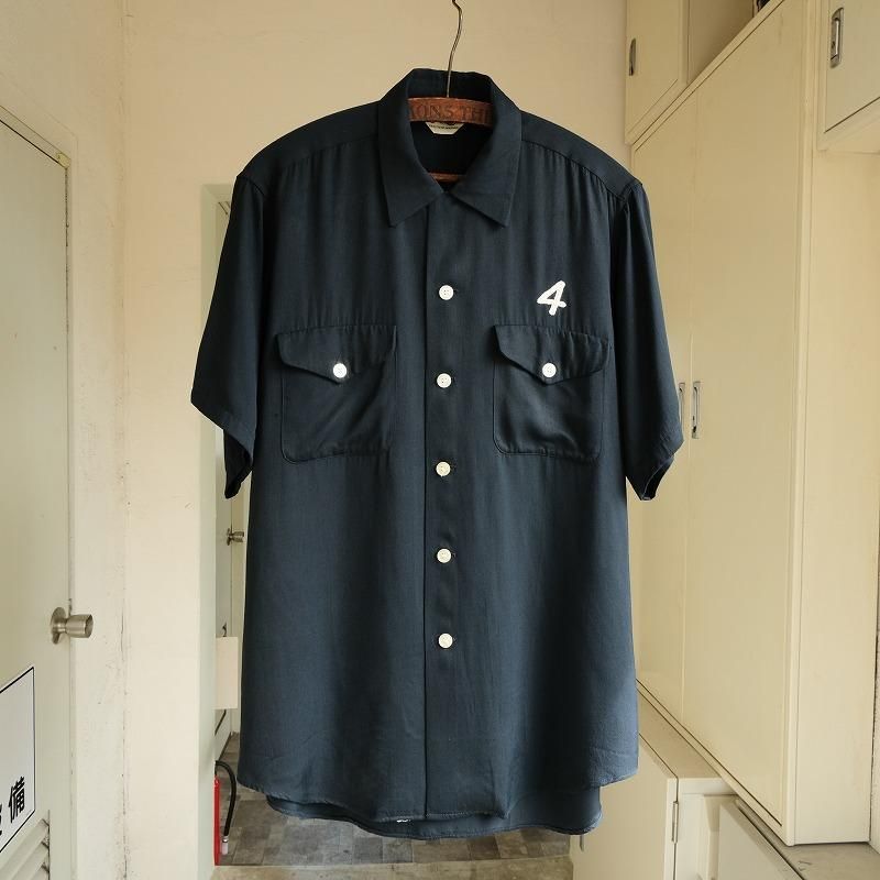 A. SERVICE BOWLING SHIRT