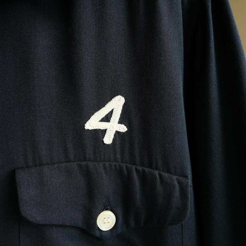 A. SERVICE BOWLING SHIRT