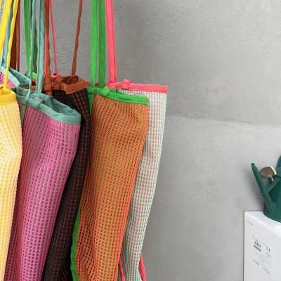 <img class='new_mark_img1' src='https://img.shop-pro.jp/img/new/icons14.gif' style='border:none;display:inline;margin:0px;padding:0px;width:auto;' />Mesh More Tote Bag