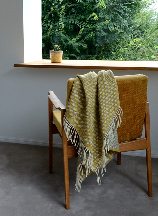 1421-chicoracao-blanket-wool-yellowgray-chair-windowside