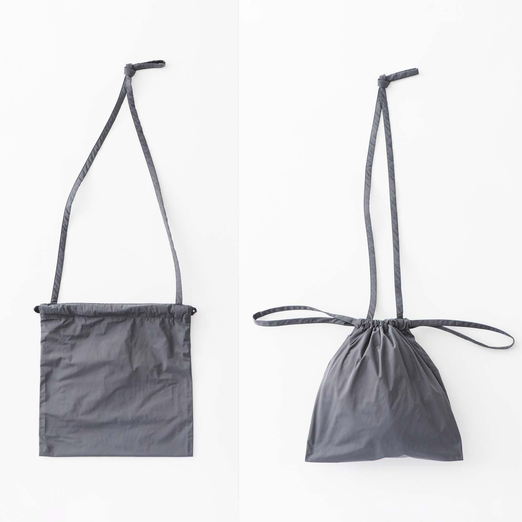 Drawstring bag with strap / 졼