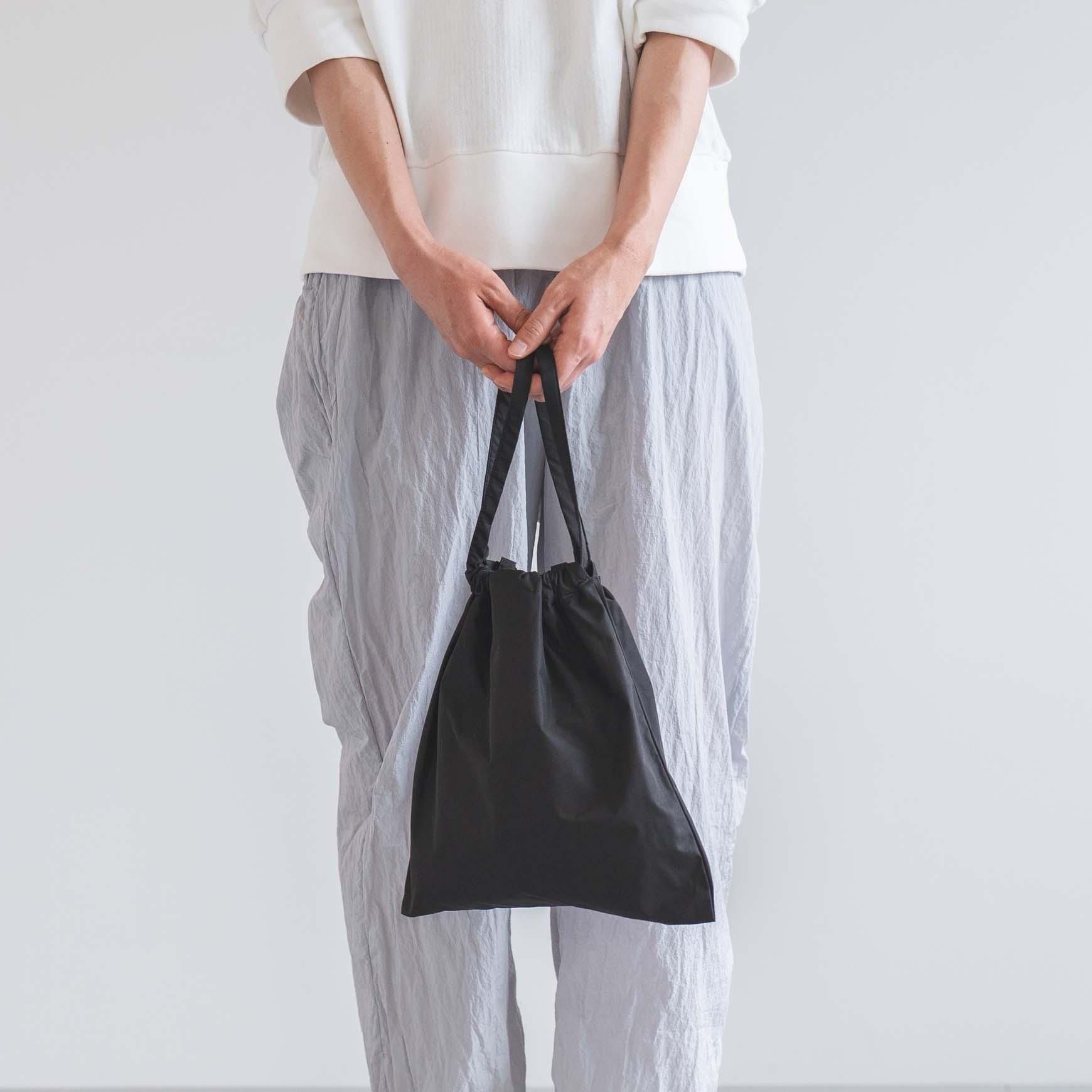 Drawstring bag with strap / ֥롼