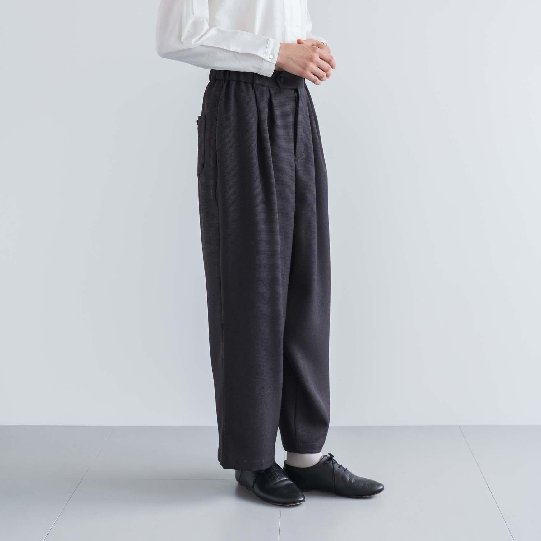 D の ポリエステルツイードのタックパンツ