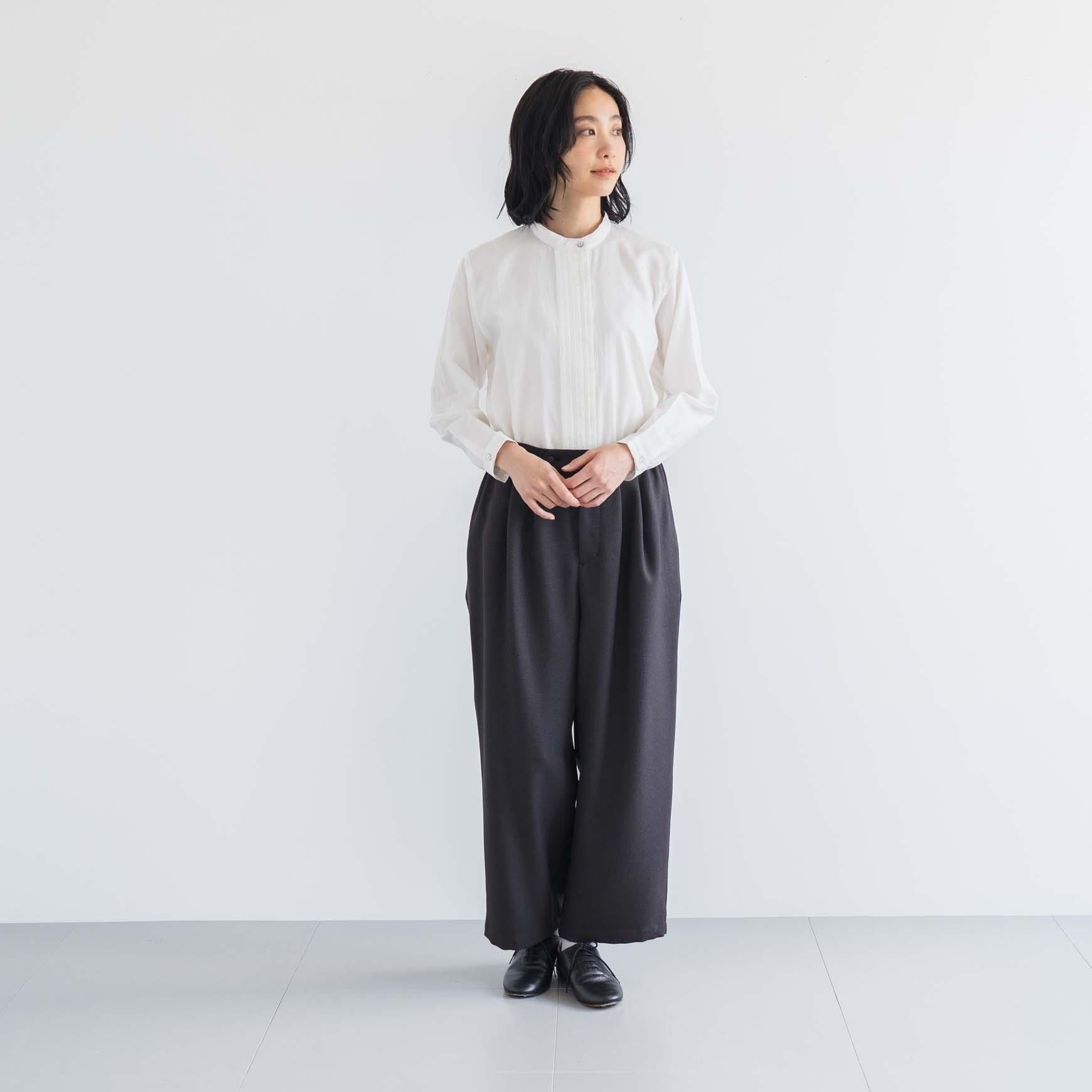 D の ポリエステルツイードのタックパンツ