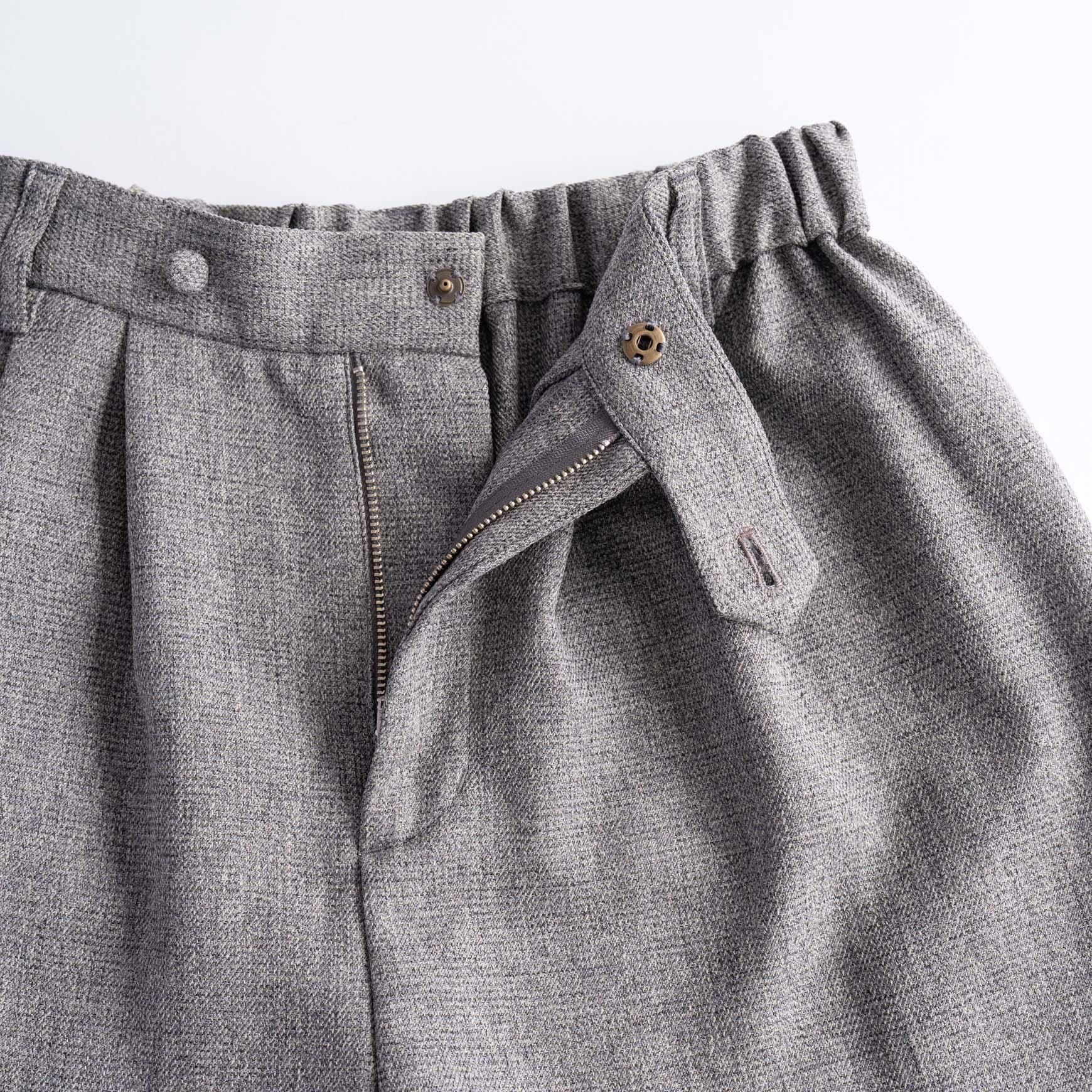 D の ポリエステルツイードのタックパンツ