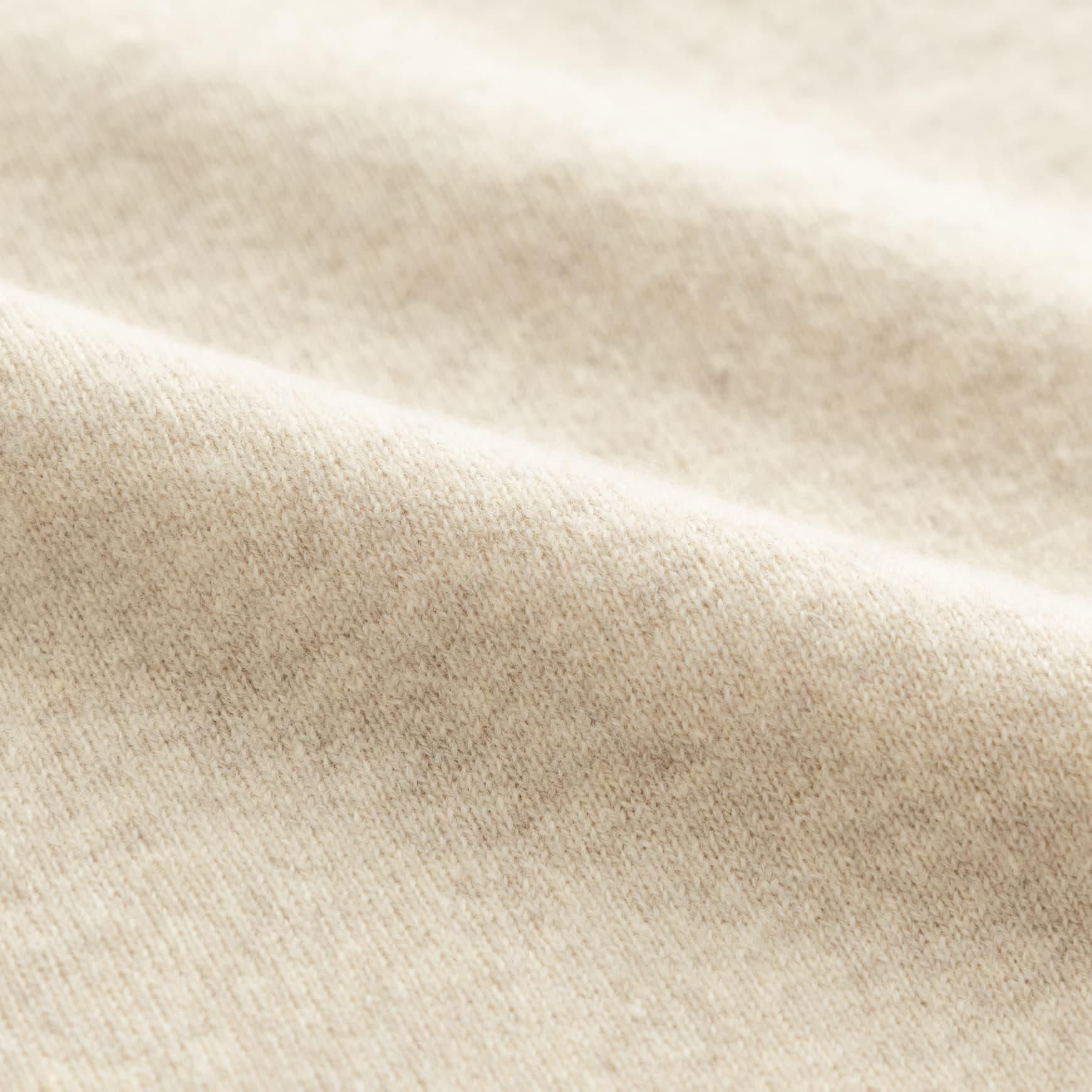 D のラムウールカーディガン