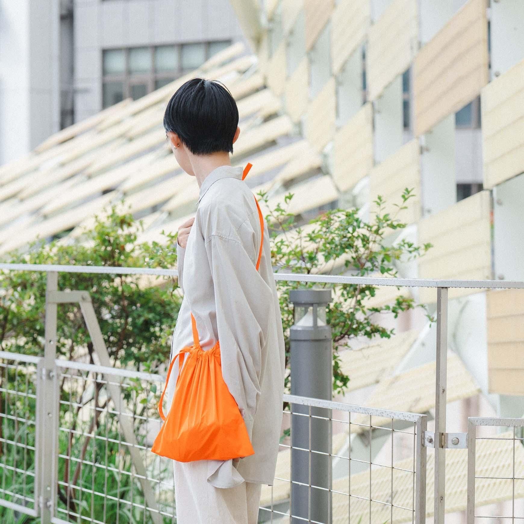 formuniform の Drawstring bag with strap 30 / オレンジ