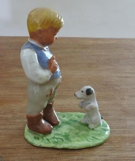 陶人形1950年代の犬と男の子の愛らしさアンティーク