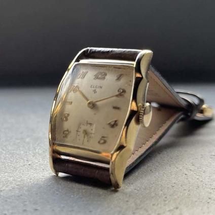 ELGIN(エルジン)10K金張 トノーケース フリルベゼル 全数字 ELGIN(エルジン)10K金張 トノーケース フリルベゼル 全数字