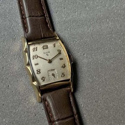 ELGIN(エルジン)10K金張 トノーケース フリルベゼル 全数字 ELGIN(エルジン)10K金張 トノーケース フリルベゼル 全数字