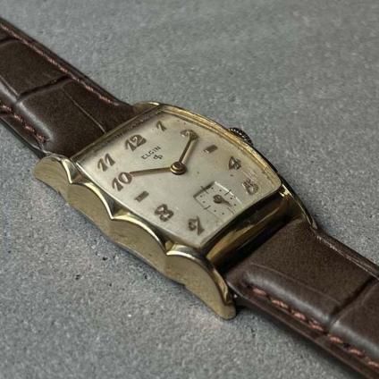 ELGIN(エルジン)10K金張 トノーケース フリルベゼル 全数字 ELGIN(エルジン)10K金張 トノーケース フリルベゼル 全数字