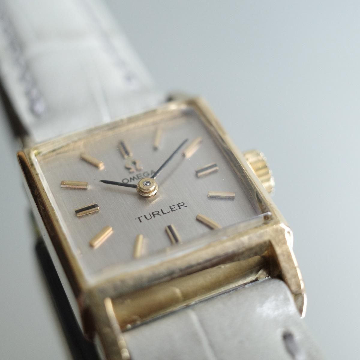 OMEGA（オメガ）TURLER Wネーム スクエアケース シルバー