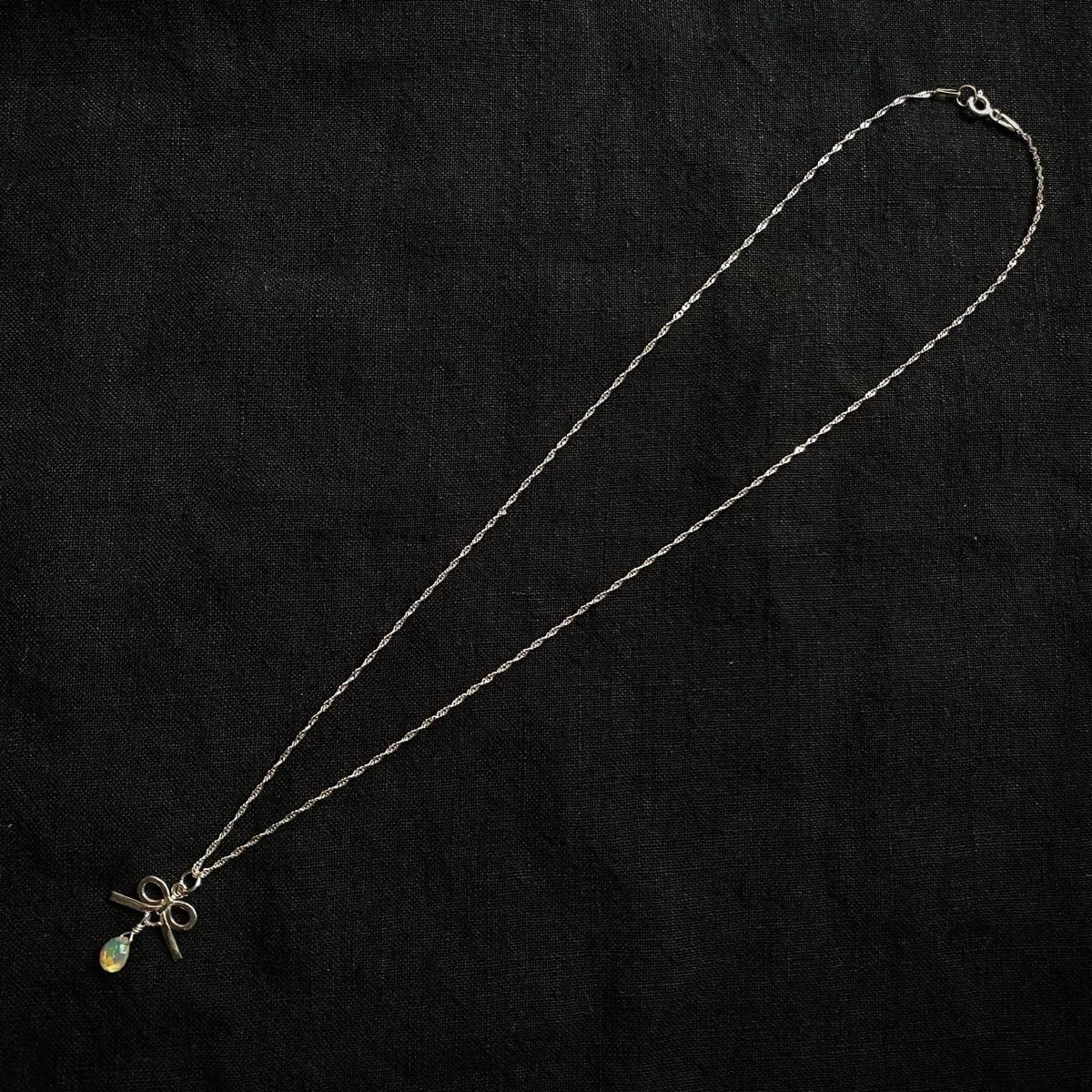 <img class='new_mark_img1' src='https://img.shop-pro.jp/img/new/icons13.gif' style='border:none;display:inline;margin:0px;padding:0px;width:auto;' />momocreatura Thread bow Necklace Silver  Opalʥ⥯ꥢ ܥ ͥå쥹 Сߥѡ