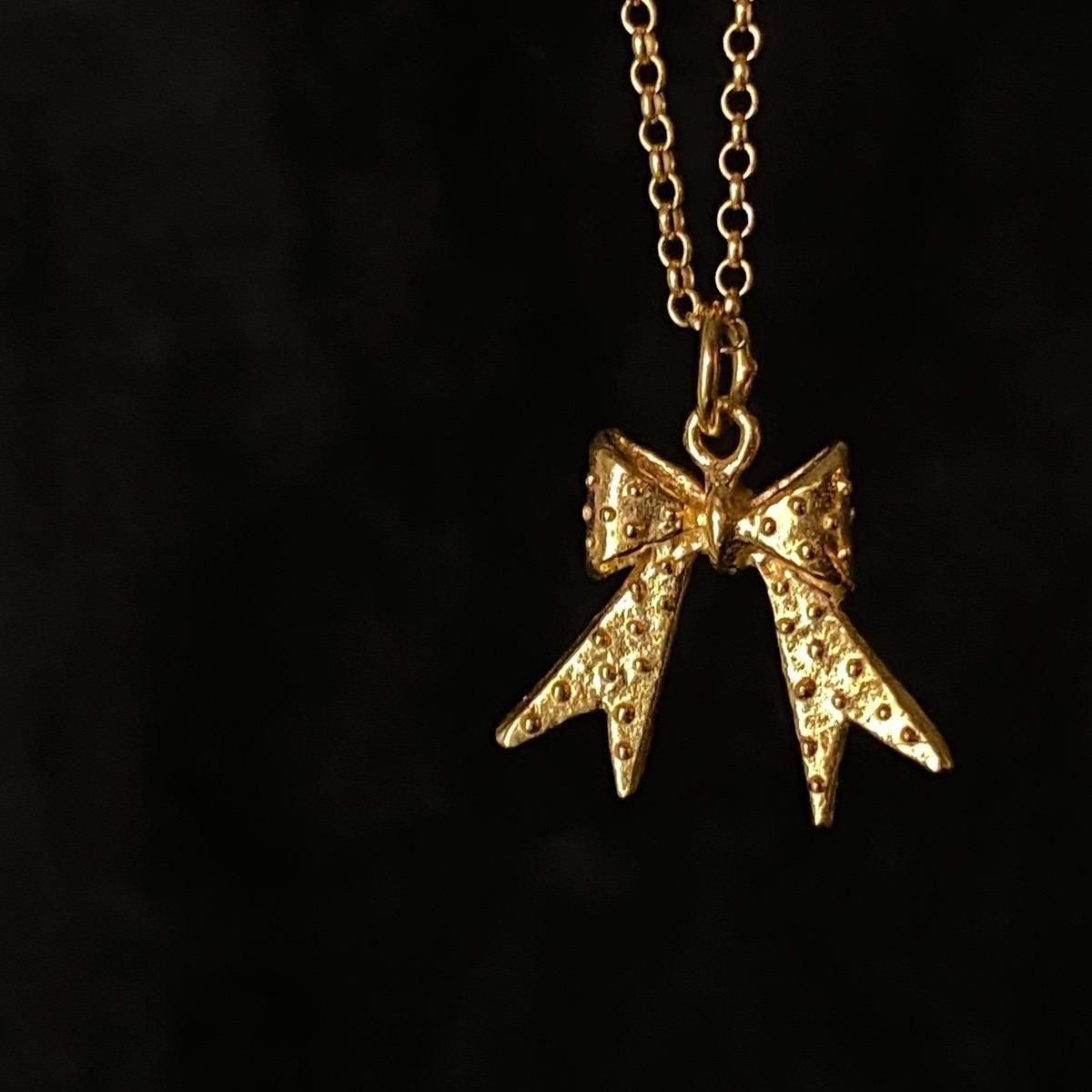 <img class='new_mark_img1' src='https://img.shop-pro.jp/img/new/icons13.gif' style='border:none;display:inline;margin:0px;padding:0px;width:auto;' />momocreatura Dotted bow Necklace Goldʥ⥯ꥢ ɥåȥܥ ͥå쥹 ɡ