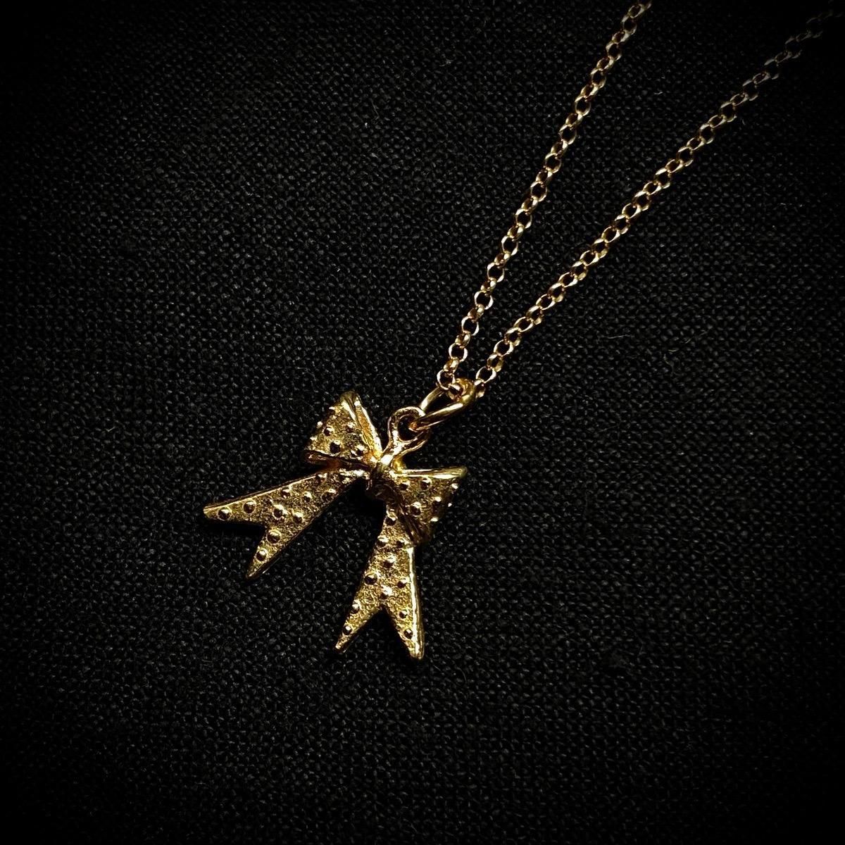 <img class='new_mark_img1' src='https://img.shop-pro.jp/img/new/icons13.gif' style='border:none;display:inline;margin:0px;padding:0px;width:auto;' />momocreatura Dotted bow Necklace Goldʥ⥯ꥢ ɥåȥܥ ͥå쥹 ɡ