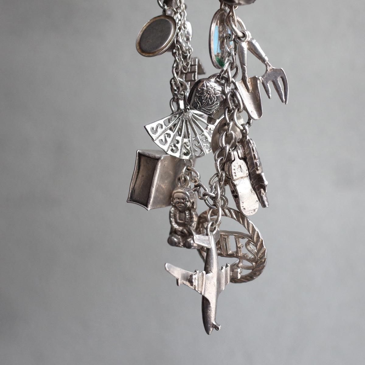 <img class='new_mark_img1' src='https://img.shop-pro.jp/img/new/icons13.gif' style='border:none;display:inline;margin:0px;padding:0px;width:auto;' />С 㡼 ֥쥹åȡVintage Silver Charm Bracelet