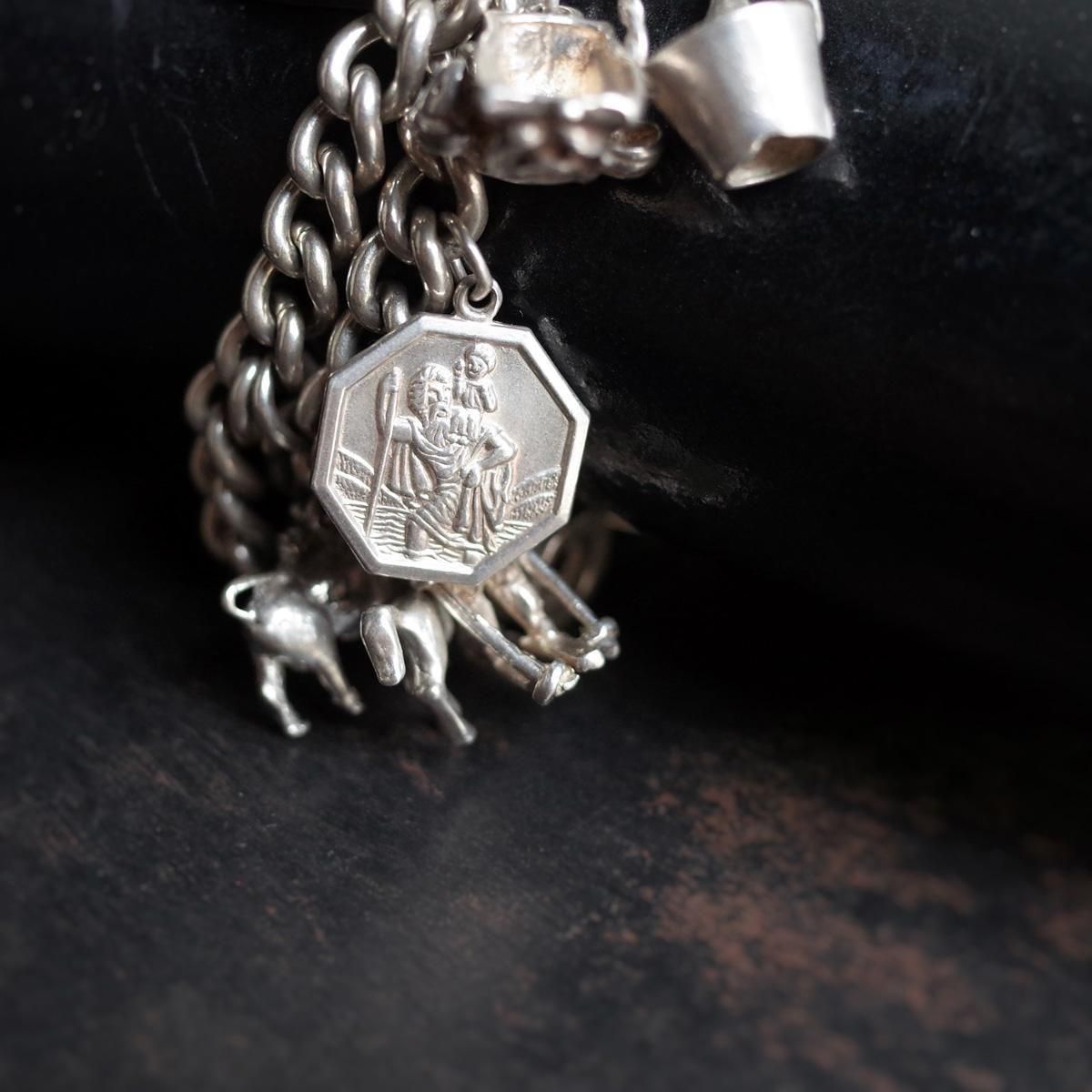 <img class='new_mark_img1' src='https://img.shop-pro.jp/img/new/icons13.gif' style='border:none;display:inline;margin:0px;padding:0px;width:auto;' />С 㡼 ֥쥹åȡVintage Silver Charm Bracelet