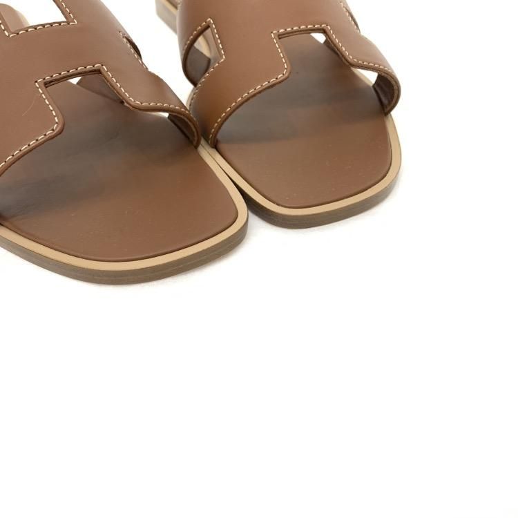 HERMES エルメス サンダル オラン フラット ゴールド 35 H021056Z HERMES エルメス サンダル オラン フラット ゴールド 35 H021056Z