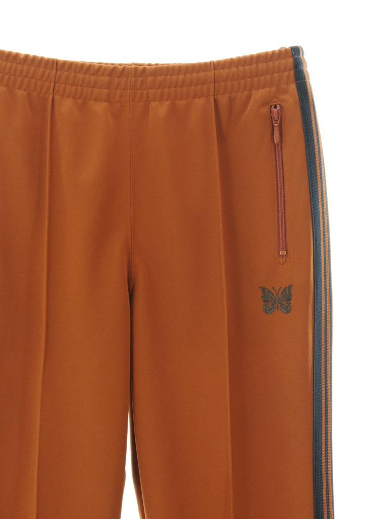 パンツ Needles Track Pant Poly Smooth Rust 2 Needles Men's Poly Smooth Zipped Track Pants in Rust Needles