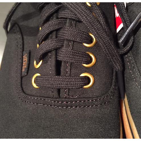 Vans black clearance gumsole gold eyelet