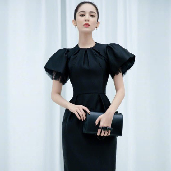 個性的でおしゃれな海外ドレス エレガントなボリューム袖のミディアム黒ワンピース