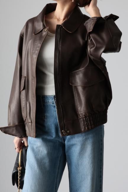 vintage like zip up shrink fake leather jacket / brown