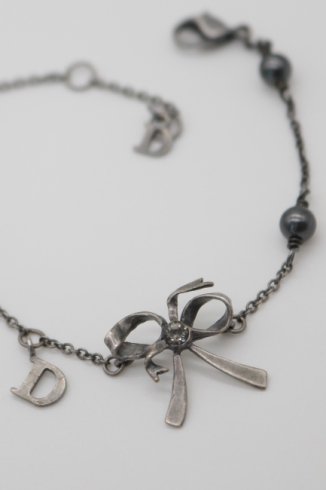 USEDChristian Dior / ribbon charm rinestone bracelet