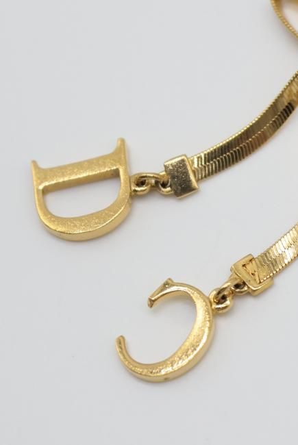 USED】 Christian Dior / CD logo charm ribbon motif bracelet