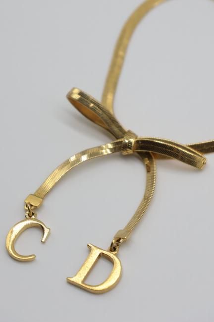 Dior クリスチャンディオール CDチャームリボンレザー ブレス ベルトタイプ USED】 Christian Dior / CD logo charm ribbon motif bracelet