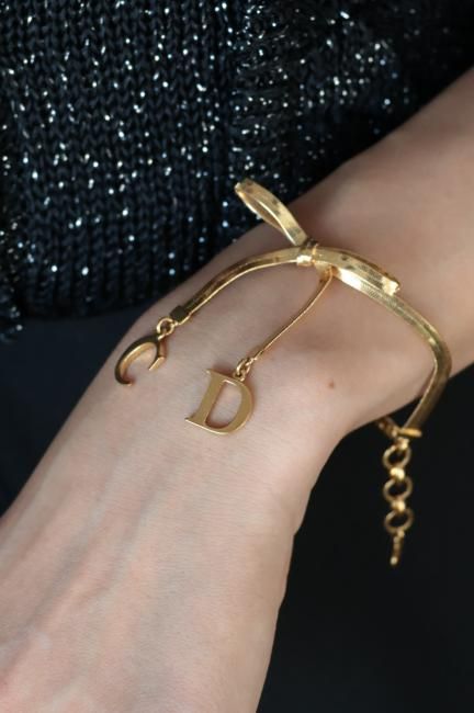 USED】 Christian Dior / CD logo charm ribbon motif bracelet