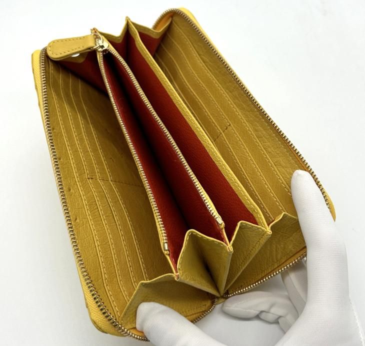 ラウンドファスナー長財布オールレザー/オーストリッチイエロー