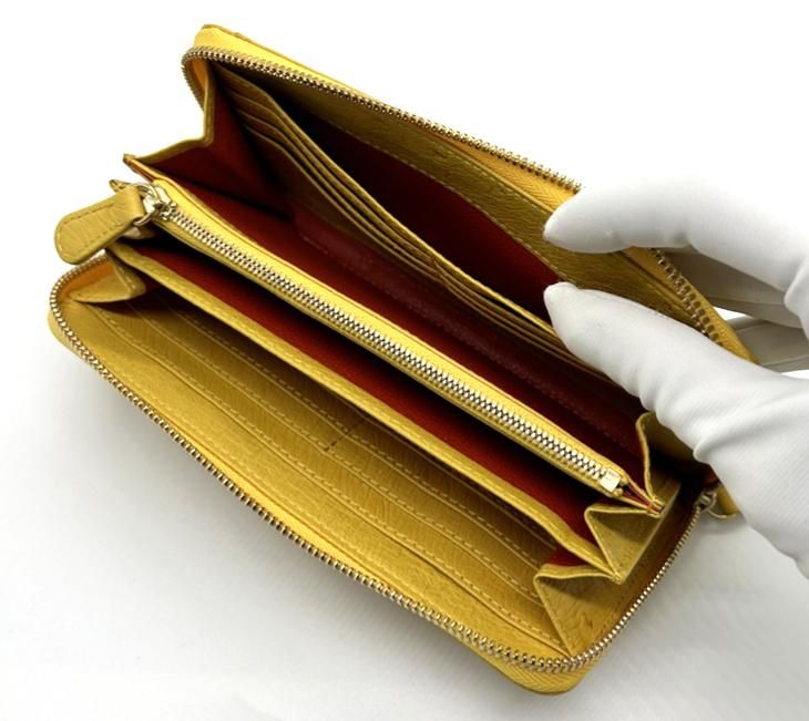 ラウンドファスナー長財布オールレザー/オーストリッチイエロー