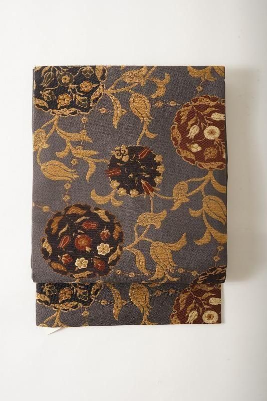 <img class='new_mark_img1' src='https://img.shop-pro.jp/img/new/icons14.gif' style='border:none;display:inline;margin:0px;padding:0px;width:auto;' />消炭色に雪輪唐花草の袋帯