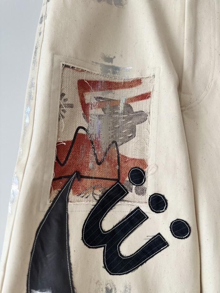 EMAM<br />Patchwork painted denim pants / IVORY<img class='new_mark_img2' src='https://img.shop-pro.jp/img/new/icons47.gif' style='border:none;display:inline;margin:0px;padding:0px;width:auto;' />