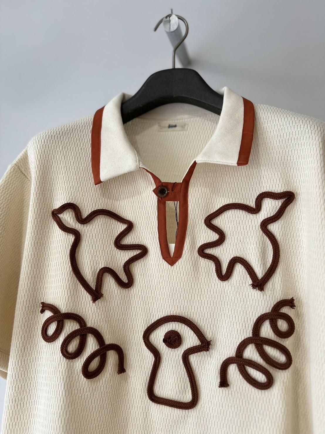EMAM<br />Design code half Sleeve Skipper / IVORY<img class='new_mark_img2' src='https://img.shop-pro.jp/img/new/icons47.gif' style='border:none;display:inline;margin:0px;padding:0px;width:auto;' />