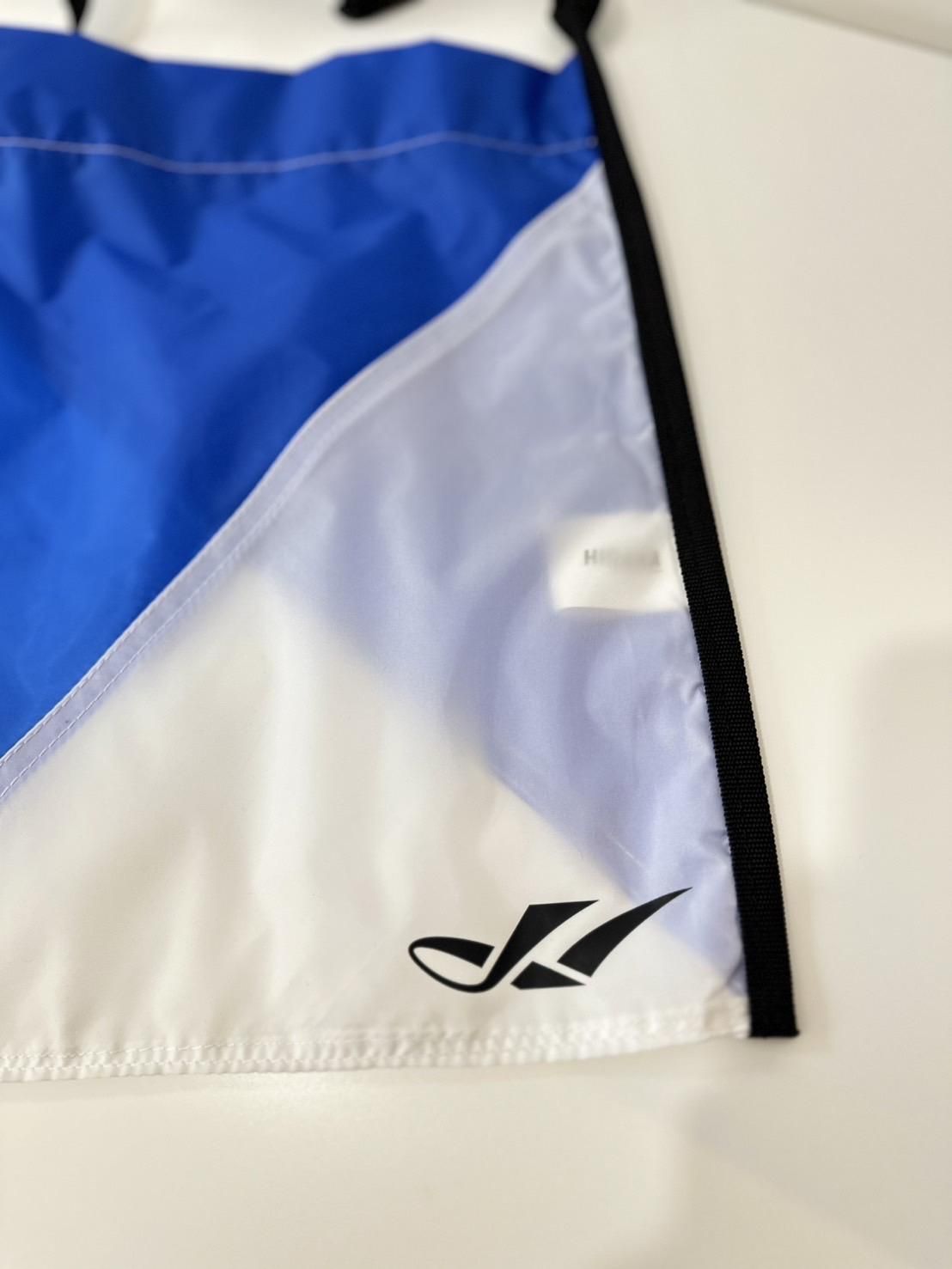 HIDAKA<br />FLAG TOTE / BLUE <img class='new_mark_img2' src='https://img.shop-pro.jp/img/new/icons47.gif' style='border:none;display:inline;margin:0px;padding:0px;width:auto;' />
