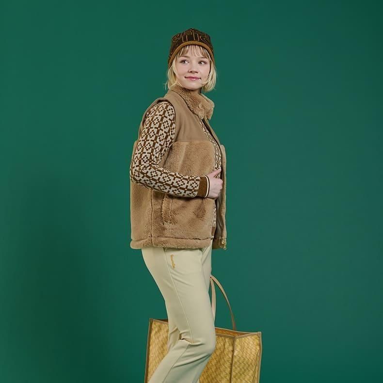 ウィメンズ スイッチングファーベスト ブラウン | Resurrection